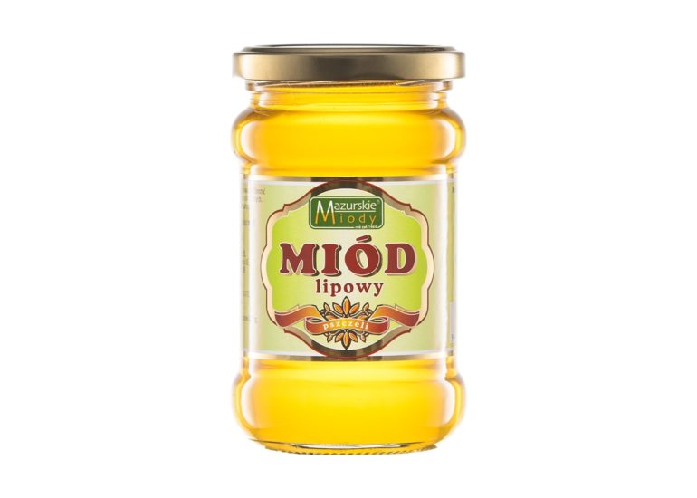 Słoik miodu lipowego na białym tle w studio fotografii produktowej w Olsztynie